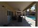 Spacious covered patio adjacent to refreshing pool at 9843 Frosty Canyon Ct, Las Vegas, NV 89183