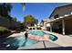 Inviting backyard oasis featuring a sparkling pool and spa at 9843 Frosty Canyon Ct, Las Vegas, NV 89183