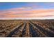 Wide aerial shot captures the scale of the community, with its neatly organized streets and distant city views at 9916 Sierra Canyon Way, Las Vegas, NV 89147