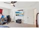 Spacious bedroom featuring a work station and relaxing TV area at 9916 Sierra Canyon Way, Las Vegas, NV 89147