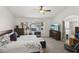 Comfortable main bedroom with vaulted ceiling, large window, and ensuite bathroom at 9916 Sierra Canyon Way, Las Vegas, NV 89147