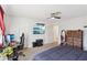 Spacious bedroom featuring a work station and relaxing TV area at 9916 Sierra Canyon Way, Las Vegas, NV 89147