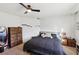 Bright bedroom showcasing a dresser and a comfortable bed at 9916 Sierra Canyon Way, Las Vegas, NV 89147