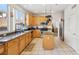 Bright kitchen with stainless steel appliances, granite countertops, and ample cabinet space at 9916 Sierra Canyon Way, Las Vegas, NV 89147