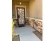 Inviting entryway with decorative door and stonework at , Henderson, NV 89011