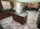 Kitchen with large granite island and view into living room at , Henderson, NV 89011