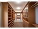 Walk-in closet featuring custom shelving and ample storage space at 8682 Waterford Bend St, Las Vegas, NV 89123