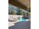 Inviting backyard pool and spa, perfect for relaxing and entertaining outdoors with beautiful landscaping and trees at , Las Vegas, NV 89123