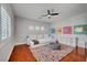 Relaxing Gathering room with hardwood floors and comfortable seating at 10213 Owls Peak Ct, Las Vegas, NV 89144