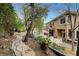 Stone pathway meanders through the backyard to the pool area at 10213 Owls Peak Ct, Las Vegas, NV 89144