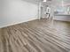 Open living space with light gray wood-look flooring at 10425 Seelos St, Las Vegas, NV 89178