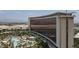 Panoramic aerial view of the Red Rock Casino, pool area, and Las Vegas cityscape at 11250 Hidden Peak Ave # 208, Las Vegas, NV 89135