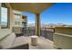 Balcony featuring a seating area with mountain views at 11250 Hidden Peak Ave # 208, Las Vegas, NV 89135