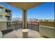 Balcony featuring mountain views and a seating area at 11250 Hidden Peak Ave # 208, Las Vegas, NV 89135