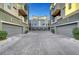 View of several garages showcasing the complex's parking and aesthetic at 11250 Hidden Peak Ave # 208, Las Vegas, NV 89135