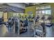 Well-equipped fitness center featuring modern exercise machines and large windows at 11250 Hidden Peak Ave # 208, Las Vegas, NV 89135