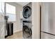 Laundry room featuring a stacked washer and dryer at 11250 Hidden Peak Ave # 208, Las Vegas, NV 89135