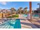 Community pool and hot tub with lounge chairs, cabanas and manicured landscaping at 11250 Hidden Peak Ave # 208, Las Vegas, NV 89135