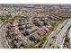 Overhead view of a densely populated neighborhood with uniform architecture, emphasizing community living at 11518 Belmont Lake Dr # 104, Las Vegas, NV 89135