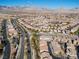 A high-angle shot of this neighborhood with mountainous backdrop is great for marketing at 11518 Belmont Lake Dr # 104, Las Vegas, NV 89135