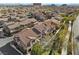 An aerial view of a community filled with trees and single-Gathering homes at 11518 Belmont Lake Dr # 104, Las Vegas, NV 89135