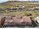 Here's an aerial view of a neighborhood with mountain views and beautiful homes at 11518 Belmont Lake Dr # 104, Las Vegas, NV 89135