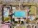 Aerial view that shows the large, resort-style pool, spa, lounge area, and manicured grounds at 11518 Belmont Lake Dr # 104, Las Vegas, NV 89135