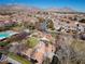 Captivating aerial view of a playground in a community, complete with a swingset, and picnic area for neighborhood enjoyment at 11518 Belmont Lake Dr # 104, Las Vegas, NV 89135