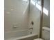 Bathroom showcasing a shower and bathtub with tile surround at 12048 La Palmera Ave, Las Vegas, NV 89138