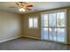 Bedroom featuring lots of natural light and a modern ceiling fan at 12048 La Palmera Ave, Las Vegas, NV 89138