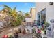 Cozy backyard patio with seating and potted plants at 122 Boysenberry Ln, Henderson, NV 89074