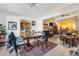 Bright dining area with view into living room and access to kitchen at 122 Boysenberry Ln, Henderson, NV 89074