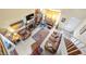 High-angle view of a living room with leather furniture and fireplace at 122 Boysenberry Ln, Henderson, NV 89074