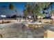 This expansive backyard features landscaping, outdoor seating, and mature trees at 1245 S Rancho Dr, Las Vegas, NV 89102