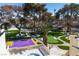 This backyard space features a putting green, basketball court, and covered outdoor seating at 1245 S Rancho Dr, Las Vegas, NV 89102