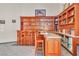 Entertain in style with this elegant home bar featuring custom wood cabinetry and ample storage for glassware and accessories at 1245 S Rancho Dr, Las Vegas, NV 89102