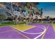 A full-size basketball court is featured in this backyard of a beautiful estate with mature trees at 1245 S Rancho Dr, Las Vegas, NV 89102