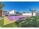 A purple and gold basketball court provides opportunities for athletic activity and outdoor fun at 1245 S Rancho Dr, Las Vegas, NV 89102