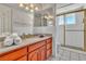 Bright bathroom featuring a shower, vanity, and ample lighting at 1245 S Rancho Dr, Las Vegas, NV 89102