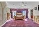 Large bedroom featuring curtains, artwork, a ceiling fan, and natural light at 1245 S Rancho Dr, Las Vegas, NV 89102