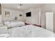 Bedroom features two twin beds, neutral walls, and ample closet space at 1245 S Rancho Dr, Las Vegas, NV 89102