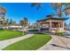 Gazebo and landscaping in the large backyard with lush lawn at 1245 S Rancho Dr, Las Vegas, NV 89102