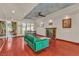 Bright living room featuring rich hardwood floors, a fireplace, and comfortable seating at 1245 S Rancho Dr, Las Vegas, NV 89102