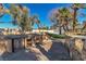 Outdoor kitchen with stainless steel appliances, stone counters and custom finishes at 1245 S Rancho Dr, Las Vegas, NV 89102