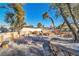 Outdoor kitchen area featuring stone accents, built-in features, and landscaping at 1245 S Rancho Dr, Las Vegas, NV 89102