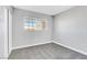 Bedroom with neutral walls and carpet, and a large window at 139 Ivy St, Henderson, NV 89015