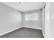 Bedroom with neutral walls and carpet, featuring a large window at 139 Ivy St, Henderson, NV 89015