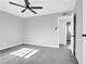 Bedroom featuring natural light, ceiling fan and attached bath access at 139 Ivy St, Henderson, NV 89015