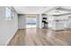 Bright, open living space adjoining a modern kitchen with stainless steel appliances at 139 Ivy St, Henderson, NV 89015