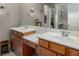 Double vanity bathroom with modern fixtures and a large mirror at 1460 Tannery Hts, Mesquite, NV 89034